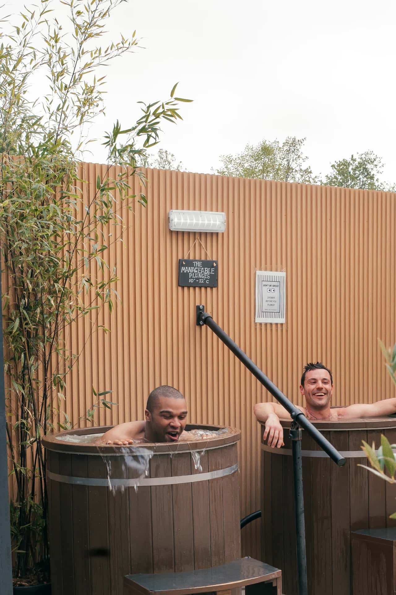 Friends chatting after a cold plunge at Lowlu